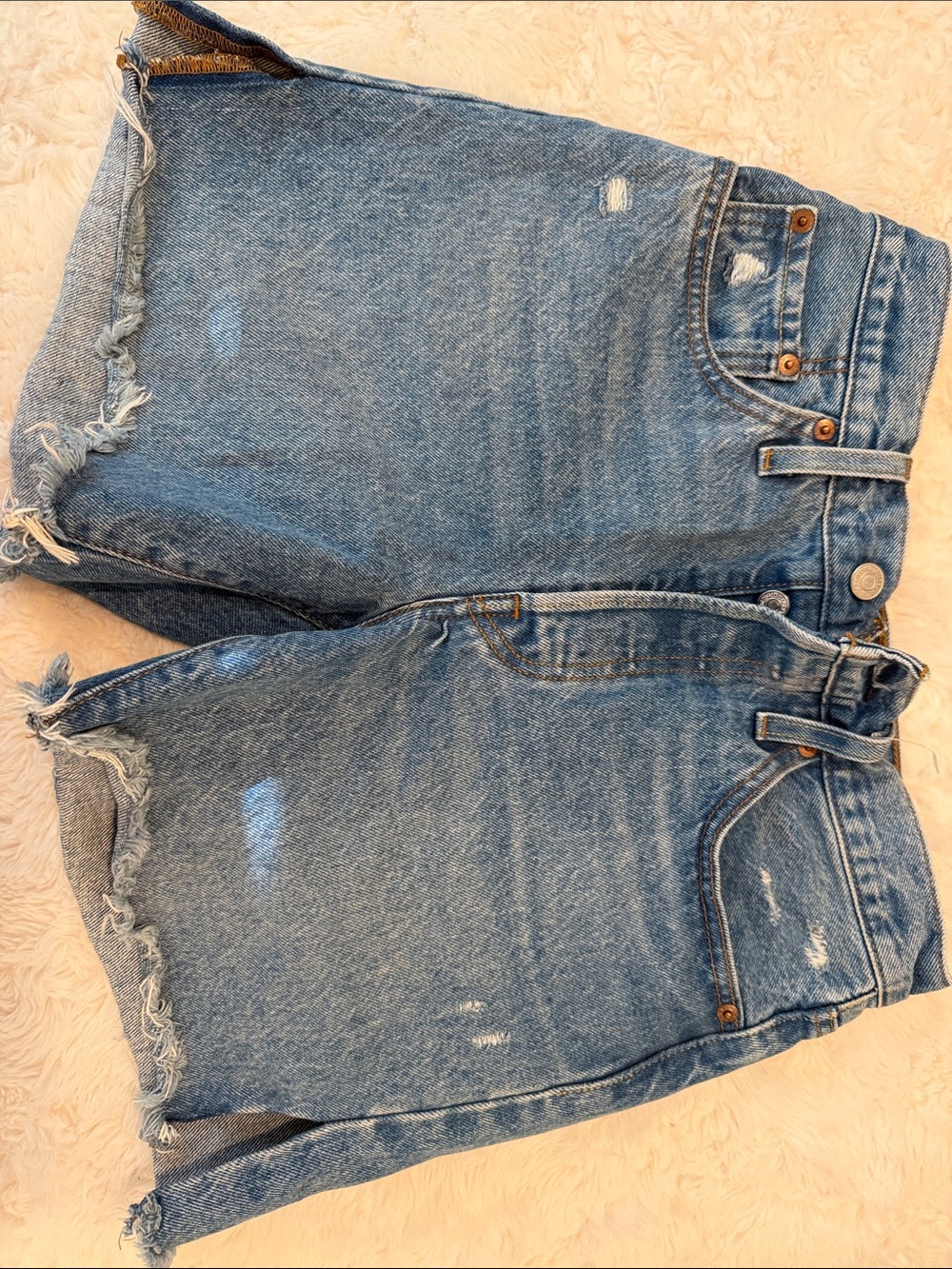 Levi's Distressed Denim Cutoff Shorts in Light Blue 501 size 26